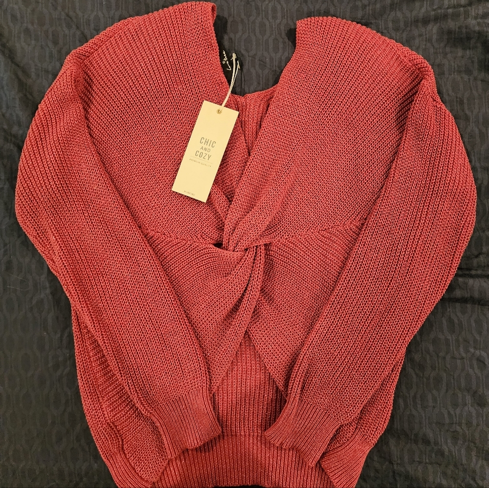 Sweater new with tags. Rose color w/slight sparkle. Boutique brand Love Tree.